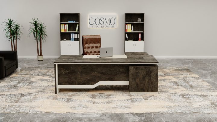 A sleek and modern executive office desk made from rich, dark wood with a spacious desktop.